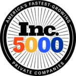 Circular “Inc. 5000” logo with colorful numbers, radiating lines, and text reading “America’s Fastest-Growing Private Companies,” conveying achievement and growth.